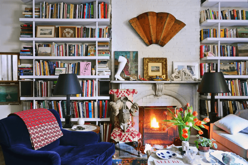 These Are The 22 Things Designers Say You Should Never Put In A Small Living Room - Decor Hint Tall Bookcases That Loom Overhead