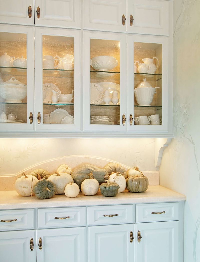 11 Simple Changes That Make A Small Kitchen Feel Spacious - Decor Hint Use Glass-Front Cabinets