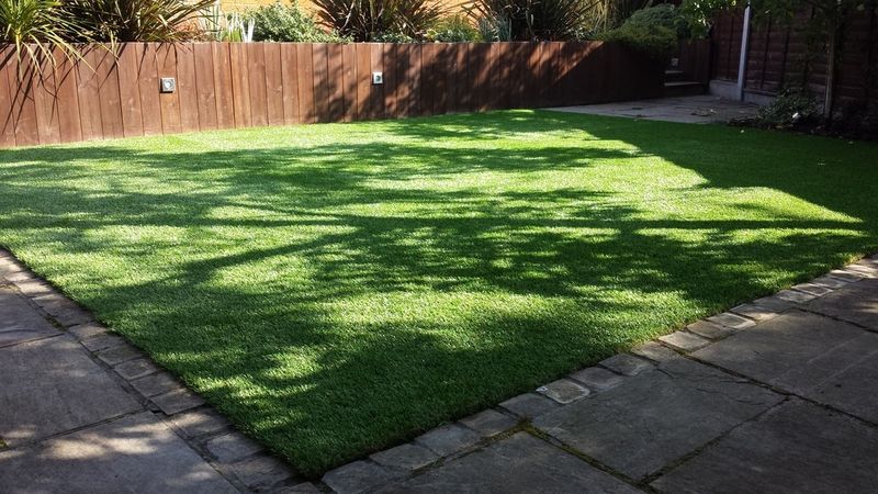 20 Things You Should Not Waste Money On For An Outdoor Space, According To Exterior Designers - Decor Hint Artificial Grass In Shaded Areas