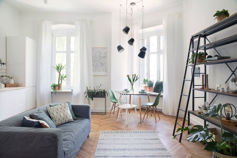 Wide ladder shelves that lean awkwardly