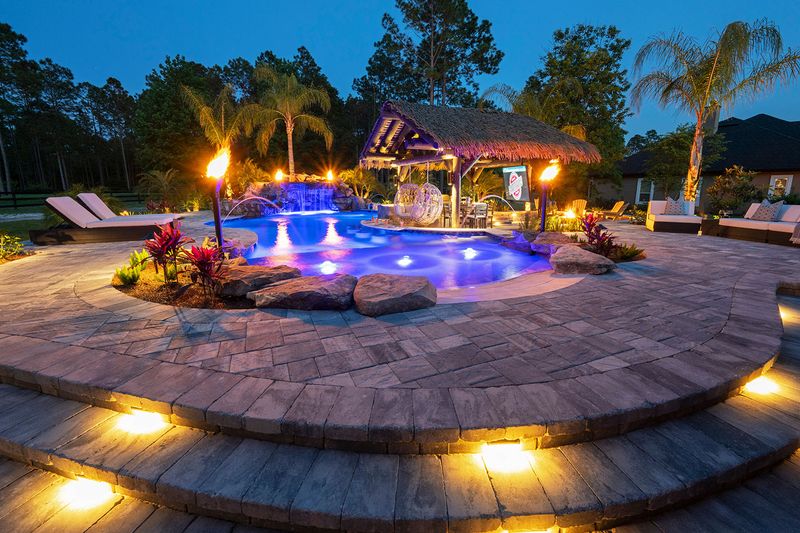 12 Stunning Outdoor Spaces Turning Heads Across Florida Neighborhoods - Decor Hint Poolside Lounges With Cabanas And Tiki Bars