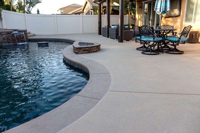 37 Stylish Poolside Designs That Make Everyday Feel Like Vacation - Decor Hint Salt-And-Pepper Poolside Flooring