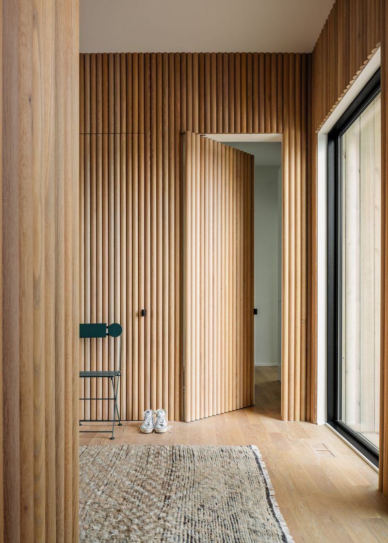 16 Ways How Designers Use Hidden Doors: The Whimsical Trend That Can Actually Be Very Practical - Decor Hint Flush Wall Door in Hallways