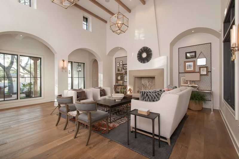 14 Mediterranean-Inspired Living Spaces That Bring A European Getaway Home - Decor Hint Open-Plan Space Featuring Arched Doorways