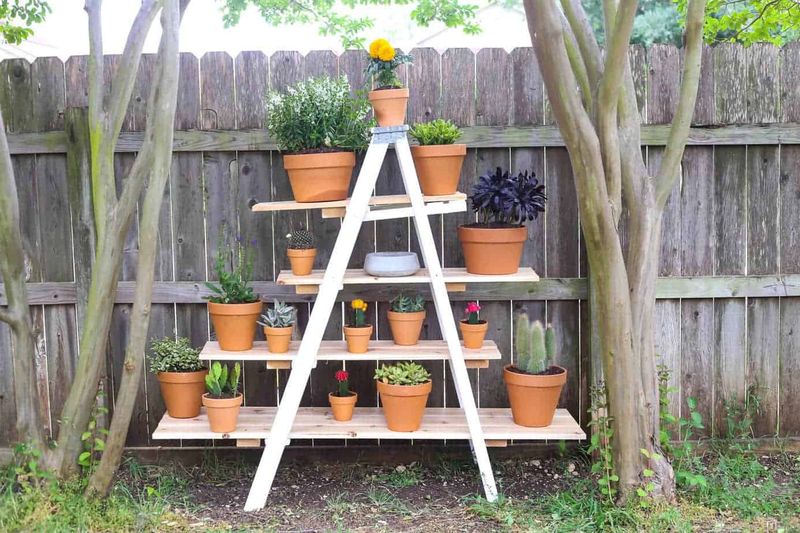 18 DIY Outdoor Decor Ideas That Look Way More Expensive Than They Are - Decor Hint Upcycled Ladder Turned into a Plant Stand