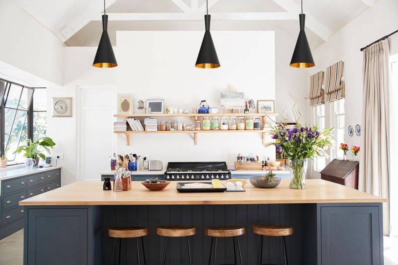 According To Experts 10 Things Hurting Your Illinois Kitchen's Style (And 10 That Help) - Decor Hint Sleek Pendant Lights (helping)