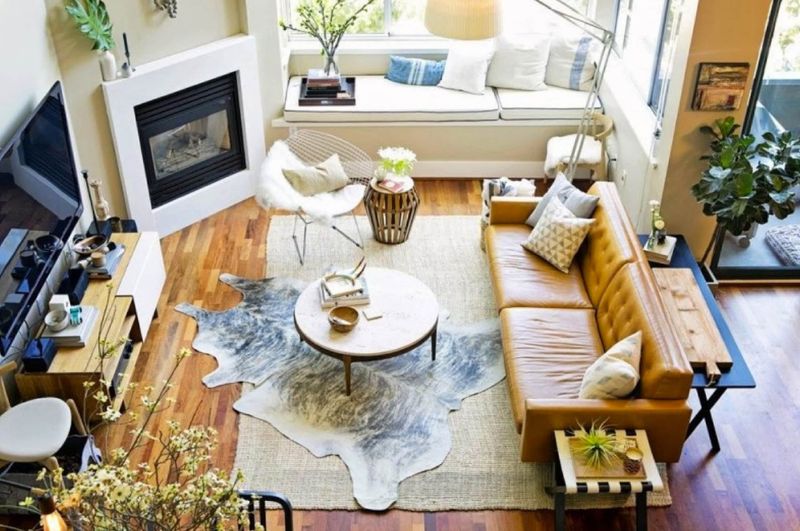 11 Timeless Decorating Trends From Idaho Homes That Blend Rustic And Elegant - Decor Hint Cowhide And Persian Rug Layering