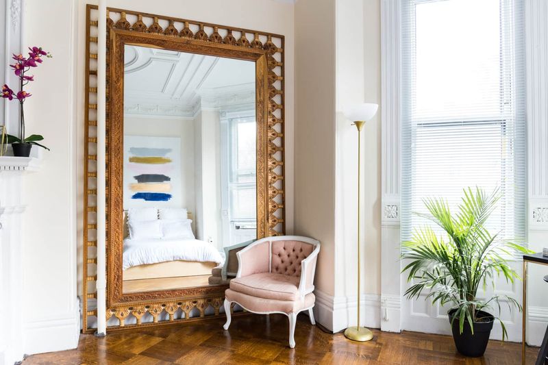 These Are The 22 Things Designers Say You Should Never Put In A Small Living Room - Decor Hint Ornate Mirrors That Weigh Down Walls