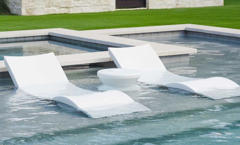37 Stylish Poolside Designs That Make Everyday Feel Like Vacation - Decor Hint Submerged Pool Lounge Chairs