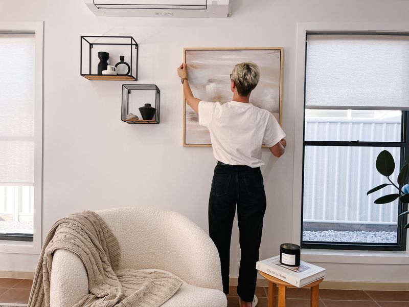 18 Most Useful Decorating Tips We've Ever Shared - Decor Hint Display Art at Eye Level