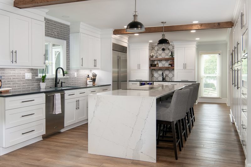 16 Items That Make Your Kitchen Look Cheap, According To Professionals (Plus 8 To Get Rid Of ASAP) - Decor Hint Garbage Can in Plain Sight (GET RID OF ASAP)