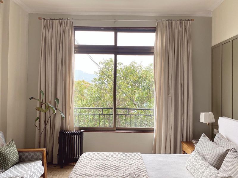 Style Your Space Better With These 9 Simple Decor Moves - Decor Hint Hang Curtains High and Wide