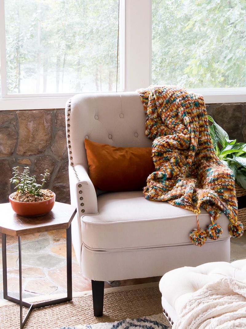 13 Cheap Fixes That Will Make Your House Feel Nicer - Decor Hint Add a Colorful Throw Blanket