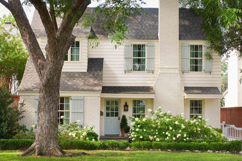 Symmetrical Windows With Classic Shutters