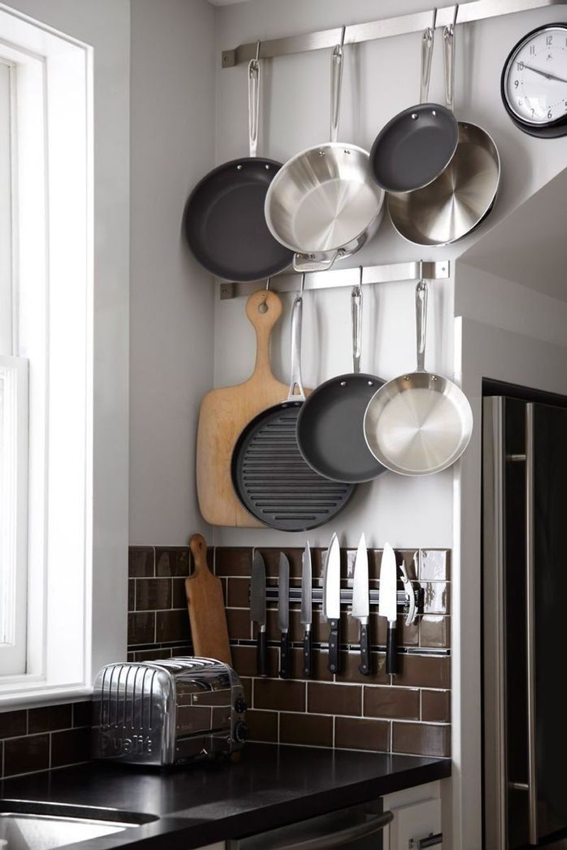 14 Smart Ways To Organize Small Spaces From A Stylish 350 Sq Ft NYC Apartment - Decor Hint Hanging Pot Racks