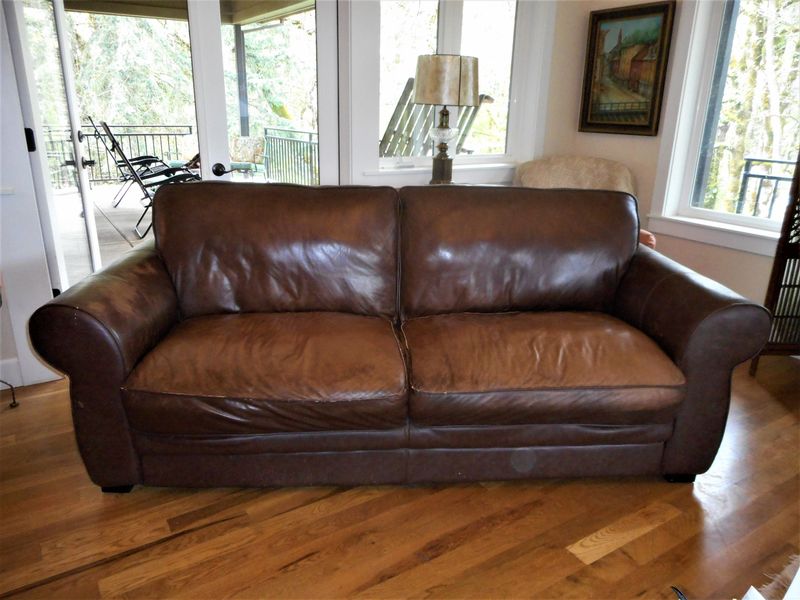 8 Outdated Couch Colors That Date Your Living Room And 4 More That Aren't Helping Either - Decor Hint Overly Distressed Leather