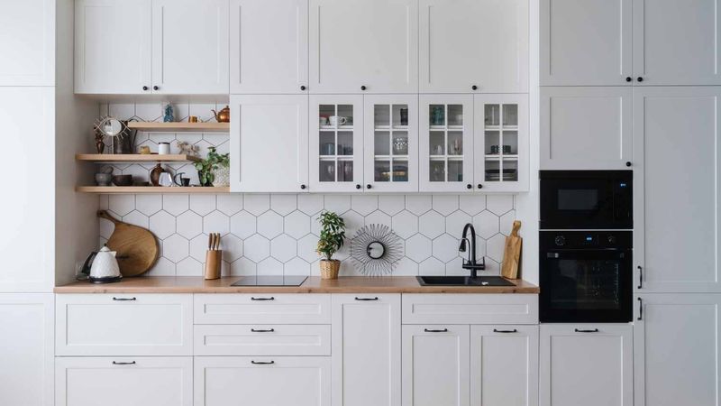 Reface kitchen cabinets with peel-and-stick veneers