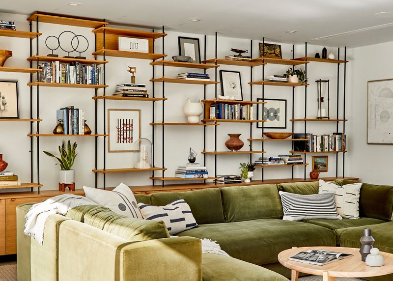 11 Common Decor Errors That Shrink The Look Of Your Home - Decor Hint Overfilled Bookshelves