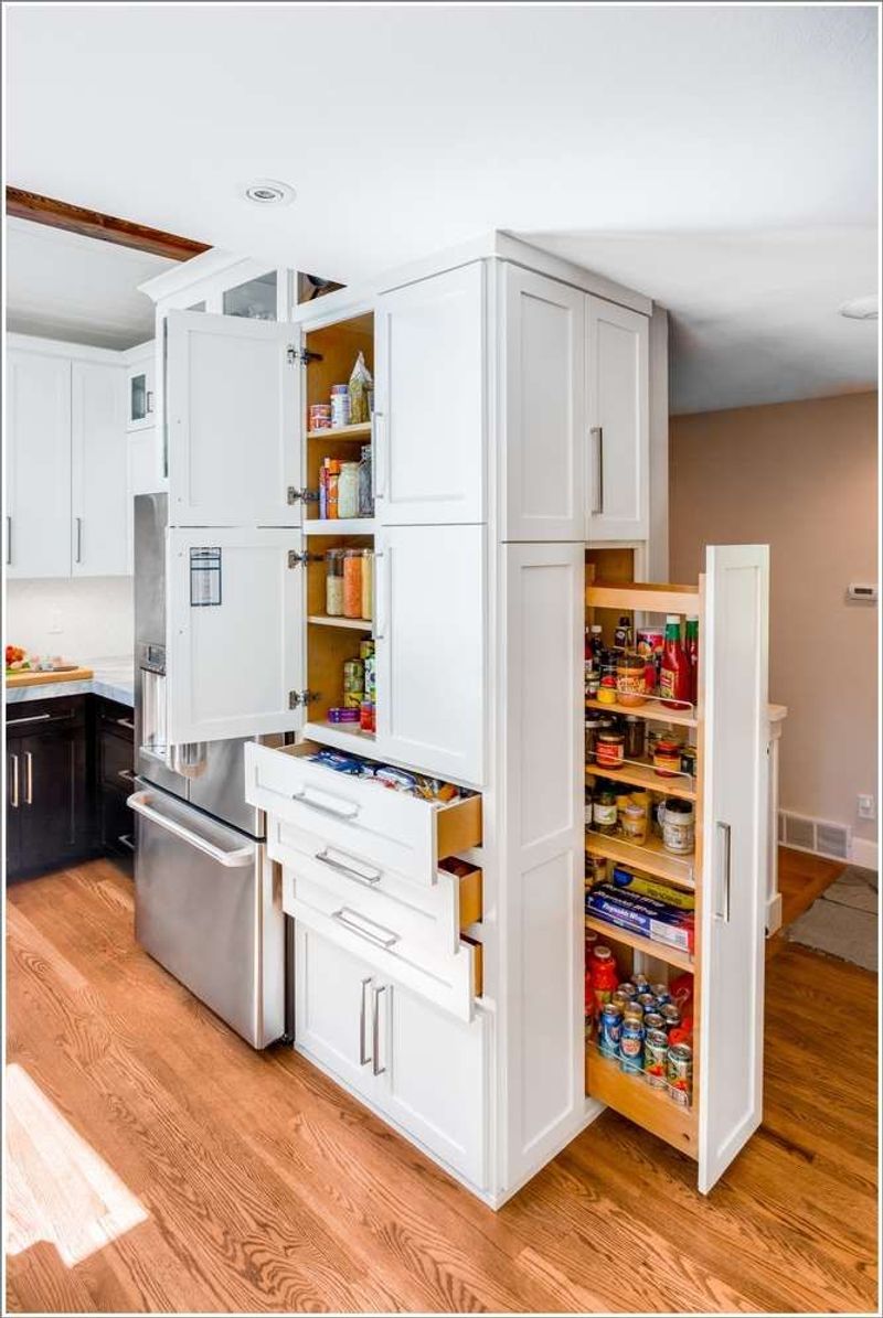The Underrated Trick Designers Use To Maximize Tiny Living Areas - Decor Hint Vertical Storage