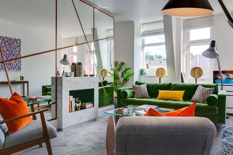20 Quick Changes To Elevate Your Living Room - Decor Hint Hang Mirrors to Reflect Light