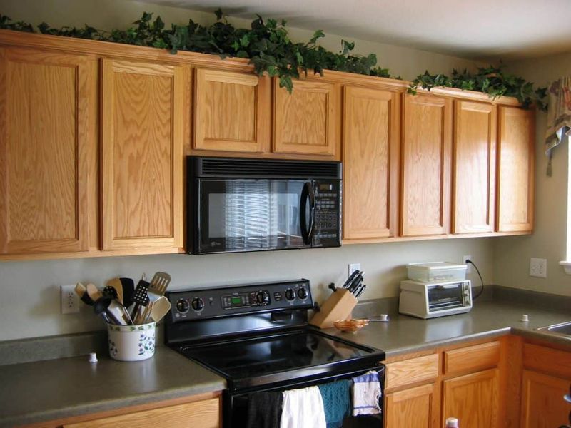 10 Items That Make Your Kitchen Look Cheap (Plus 10 That Do The Complete Opposite), According To Designers - Decor Hint Fake Plants Collecting Dust