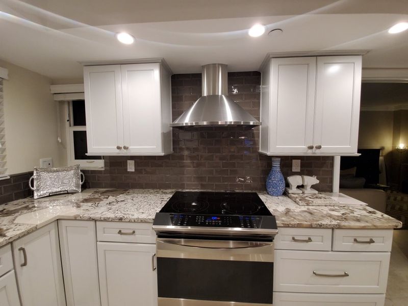 12 Impractical Kitchen Trends Interior Designers Say Won't Last In 2025 (Plus 7 Already Losing Their Momentum) - Decor Hint Floating Range Hoods That Collect Grease