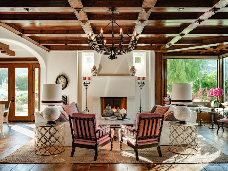 14 Mediterranean-Inspired Living Spaces That Bring A European Getaway Home - Decor Hint Living Space Highlighting Carved Wooden Furniture