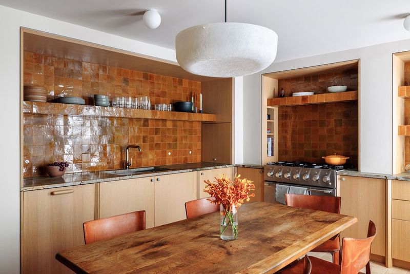 10 Earth-Toned Kitchens That Strike The Perfect Balance Between Modern & Timeless (Plus 10 That Are A Bad Choice) - Decor Hint Orange-Toned Woods Clashing With Modern Fixtures