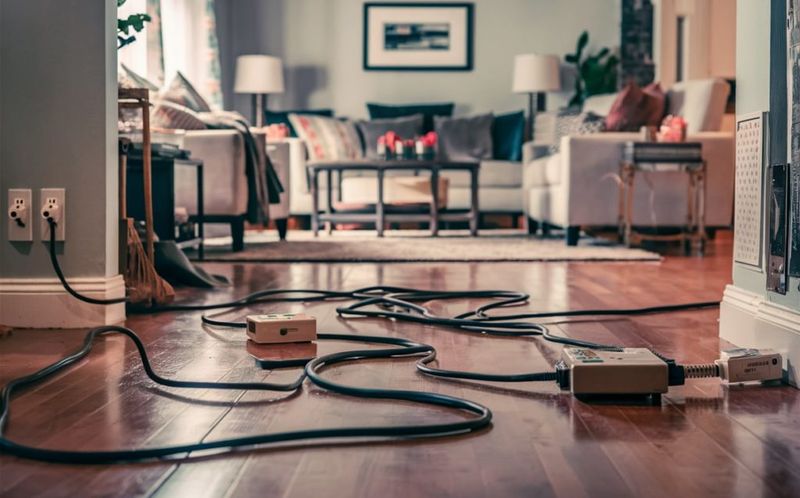 18 Reasons Your Living Room Feels Smaller Than It Is, According To Designers - Decor Hint Visible Cords And Electronics