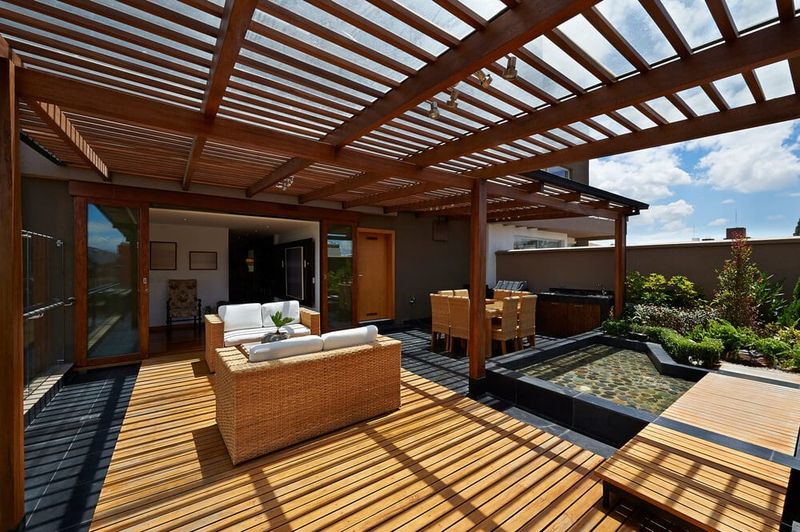 20 Things You Should Not Waste Money On For An Outdoor Space, According To Exterior Designers - Decor Hint Intricate Wooden Pergolas