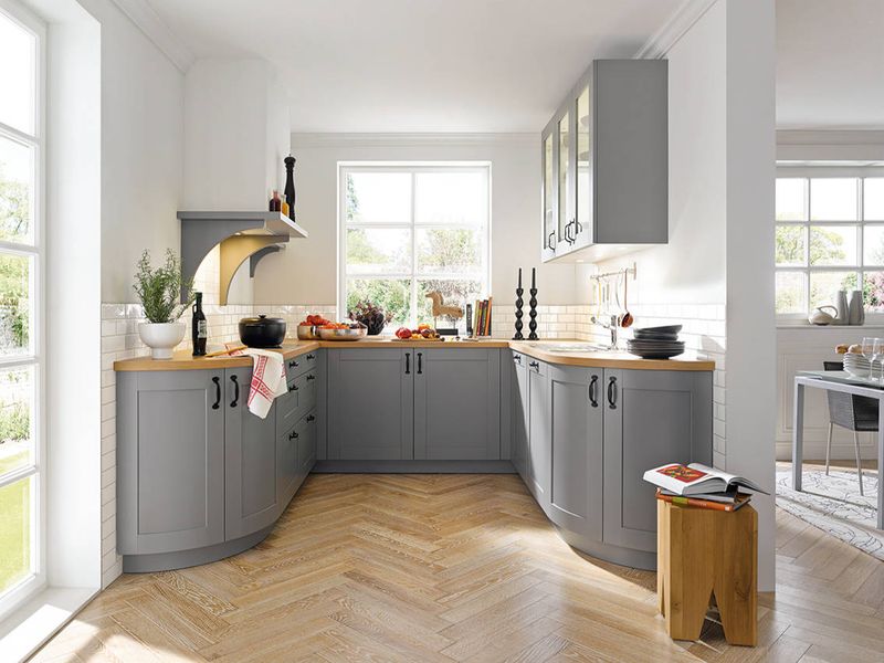 Farmhouse Style Is Over, Discover The Kitchen Looks Leading 2026 - Decor Hint Curved Cabinetry Creates Organic Flow