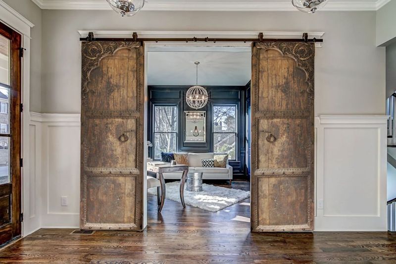 11 Timeless Decorating Trends From Idaho Homes That Blend Rustic And Elegant - Decor Hint Sliding Barn Doors With Ornate Hardware
