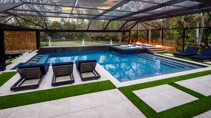 8 Backyard Design Moves That Make Florida Homes Feel Like Resorts - Decor Hint Install a Sparkling Pool with a Sun Shelf