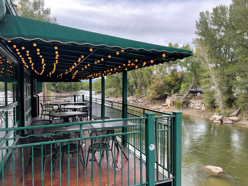 Top 8 Cozy Patios You'll Find Across Colorado Neighborhoods - Decor Hint Riverside Relaxation at The Boathouse in Salida