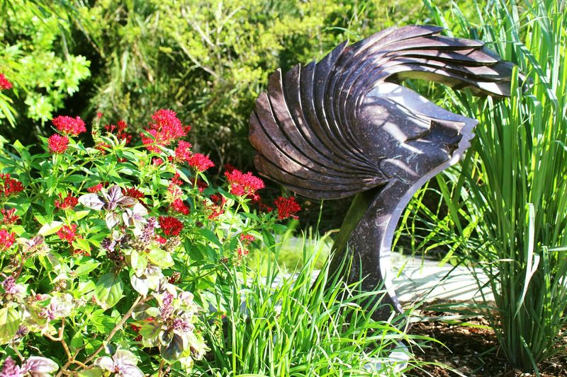 These 20 Garden Decor Ideas Are The Little Details That Will Make The Biggest Difference In Your Outdoor Space - Decor Hint Whimsical Garden Sculptures