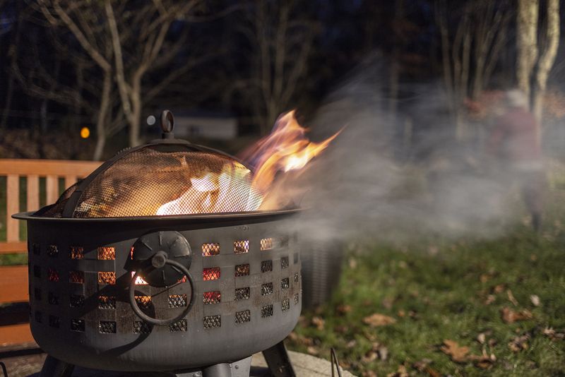 21 Landscaping Features That Are Really Annoying Your Neighbors, Real Estate Pros Say - Decor Hint Overlooking Fire Pits
