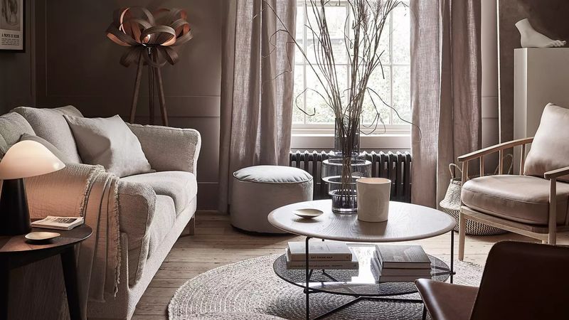 8 Couch Colors Making Michigan Living Rooms Feel Stuck In The Past, And 10 Bold Swaps To Brighten Your Space - Decor Hint Warm Taupe: The Sophisticated Neutral