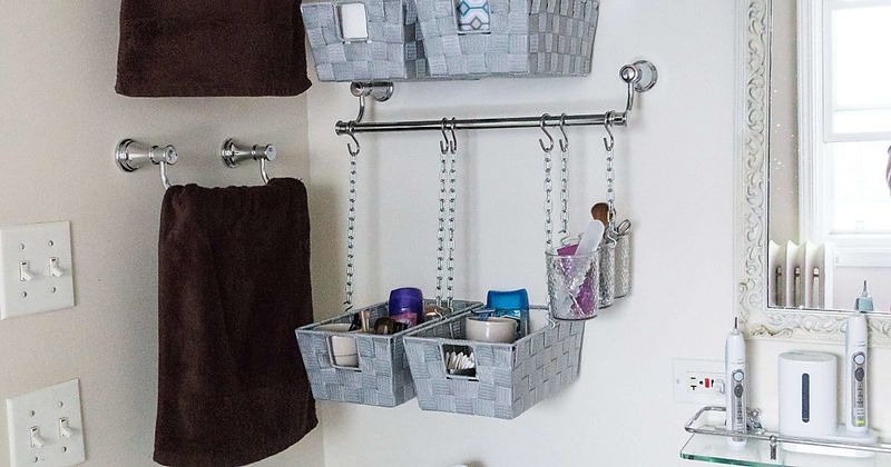 19 Smart Ways To Use That Space Above The Toilet - Decor Hint Hanging Baskets For Towels Or Toiletries