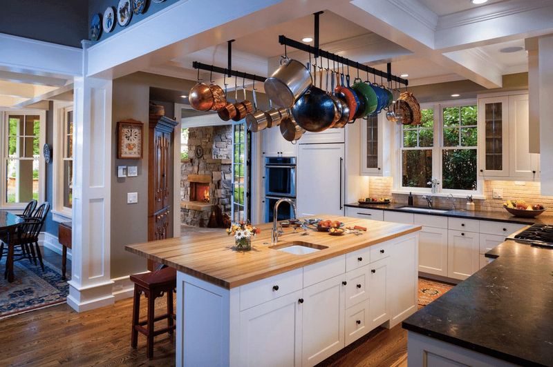 These 12 Kitchen Trends Are On Their Way Out (Plus 10 Timeless Looks To Stick With) - Decor Hint Pot Racks Hanging It Up