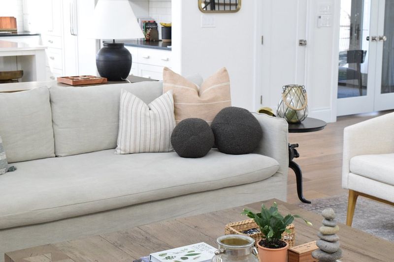 12 Interior Items Designers Say You Should Never Waste Money On (And 10 To Not Even Think About Buying) - Decor Hint Decorative Pillows in Excess