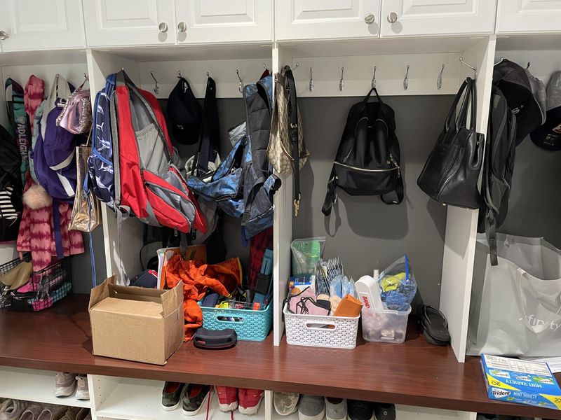 12 Invisible Mistakes Making Your Home Look Cluttered - Decor Hint Doorway Dumping Grounds