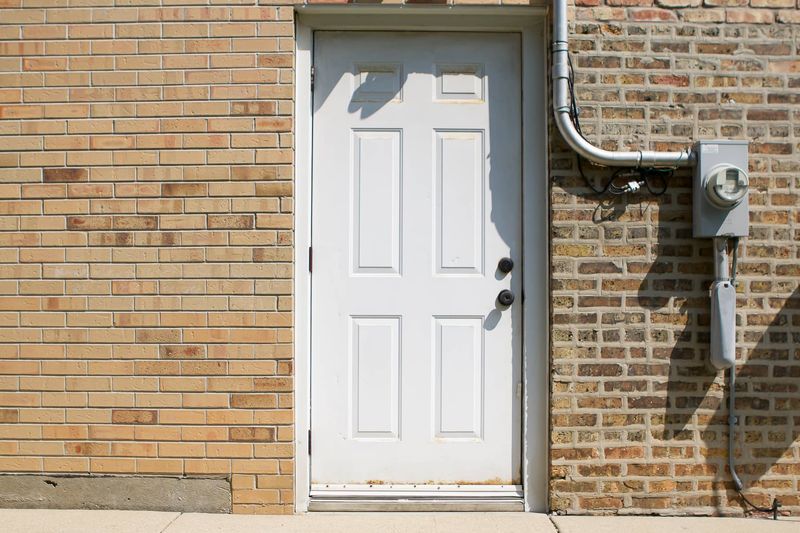 6 Front Entrance Features That Are Always Eyesores, According To Designers - Decor Hint Weathered, Peeling Front Door