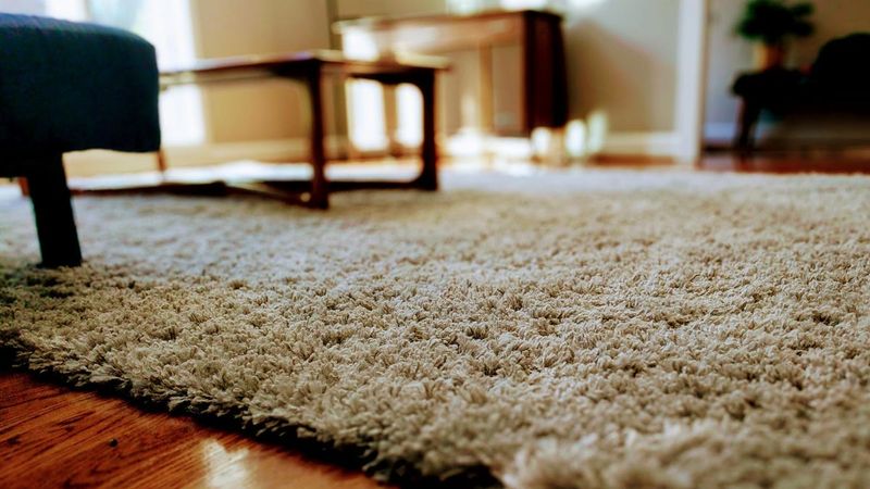 Wall-to-wall carpet in kitchen