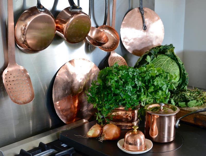 19 Old-World Design Elements That Bring A Rich Timeworn Elegance And Character To Any Space - Decor Hint Copper Pots and Pans on Display