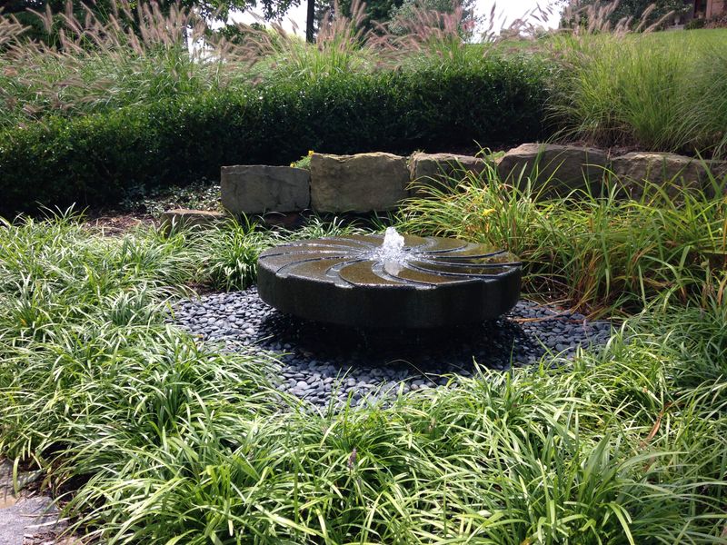 Charming Outdoor Corners That Give Georgia Homes Their Magic - Decor Hint Small Fountains Nestled in Garden Nooks