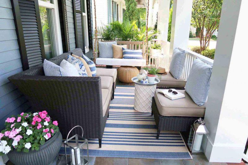 These 10 Las Vegas Homes Prove Coastal-Inspired Curb Appeal Can Work Anywhere - Decor Hint Porch Paradise With Driftwood Influences