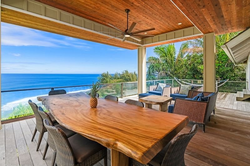 11 Backyards In Hawaii That Always Feel Like A Personal Escape - Decor Hint Hanging Egg Chairs On Wooden Lanais