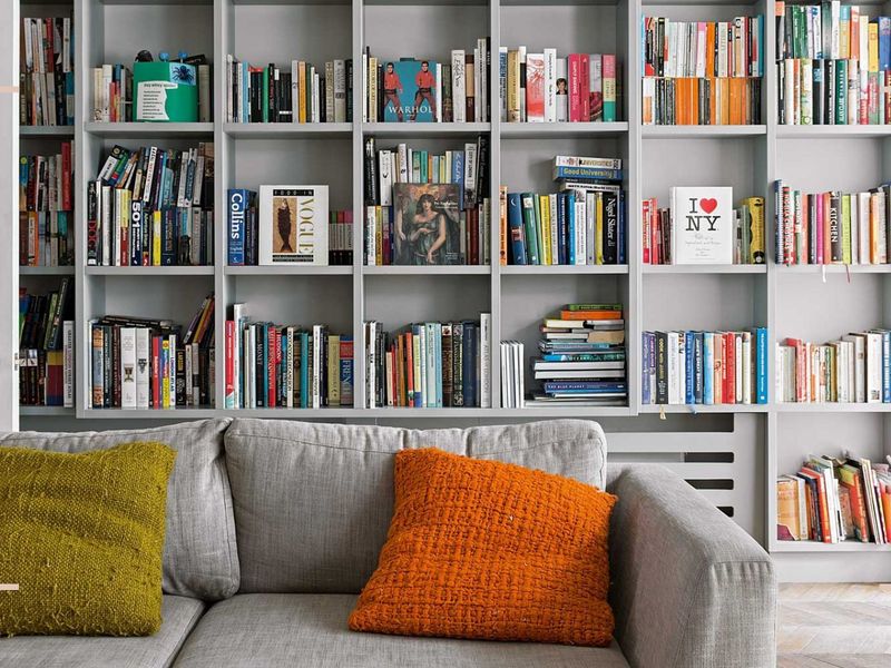 12 Items In Your Living Room That Make Your Home Look Cluttered - Decor Hint Overflowing Bookshelves