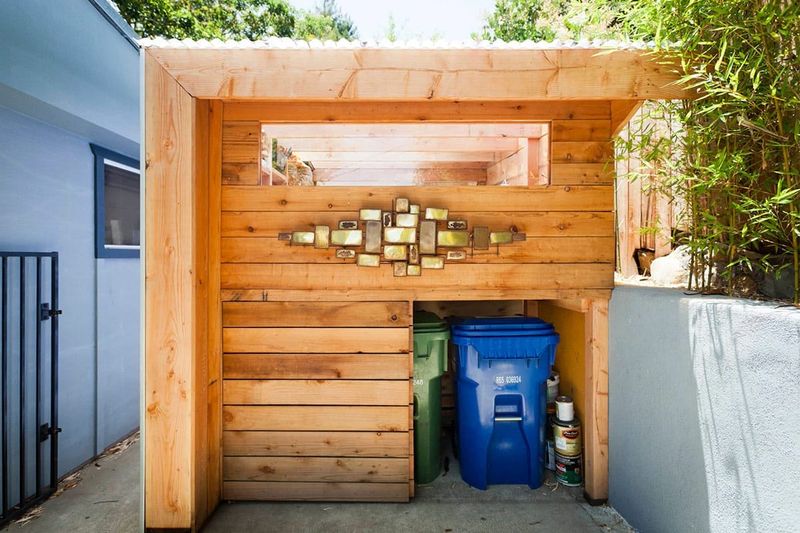 14 Clever Storage Tricks For Cleaning Up Your Backyard - Decor Hint Concealed Trash And Recycling Stations