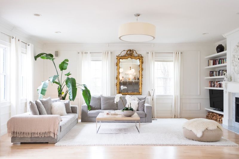 Designers Swear By These 19 French Country Living Room Tricks - Decor Hint Using Large Mirrors To Reflect Light